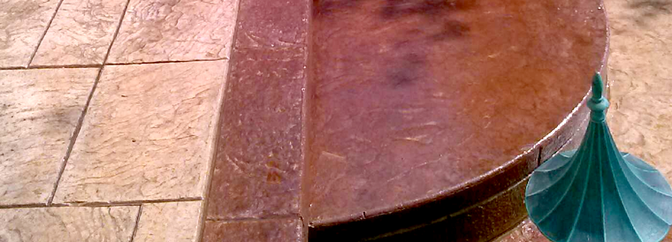 A close up of a wooden table on a tiled floor.