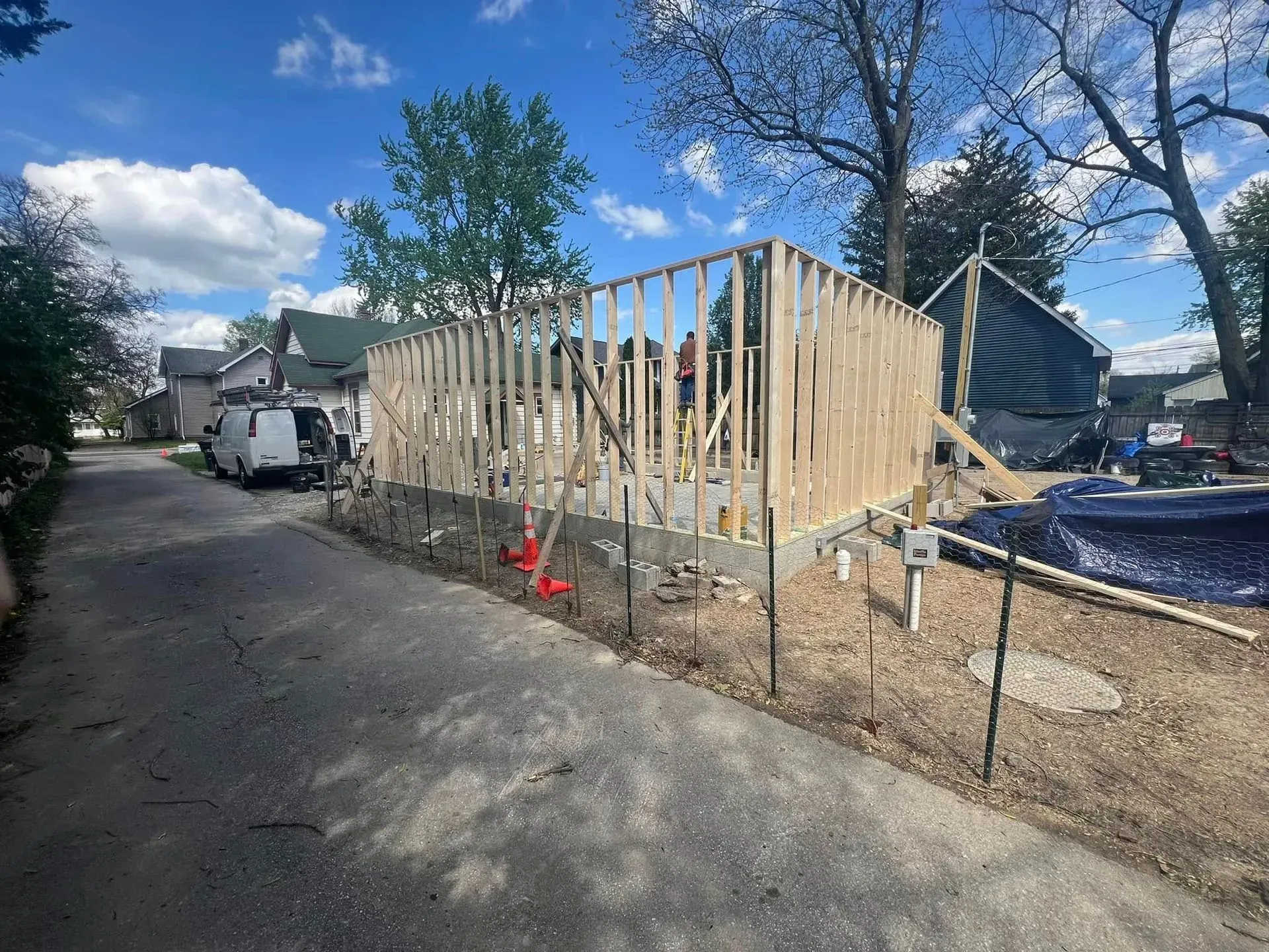 A house is being built on the side of the road.