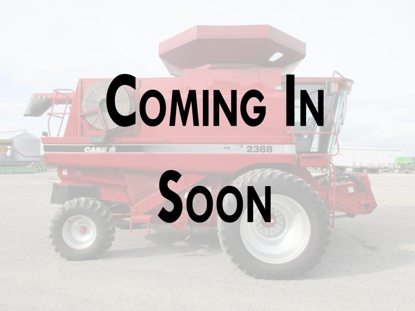Red combine harvester with bold text “Coming In Soon” over a faded farm background