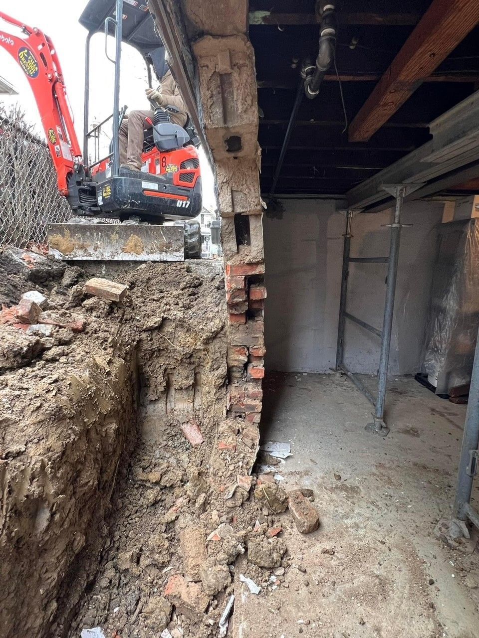 Demolished basement wall
