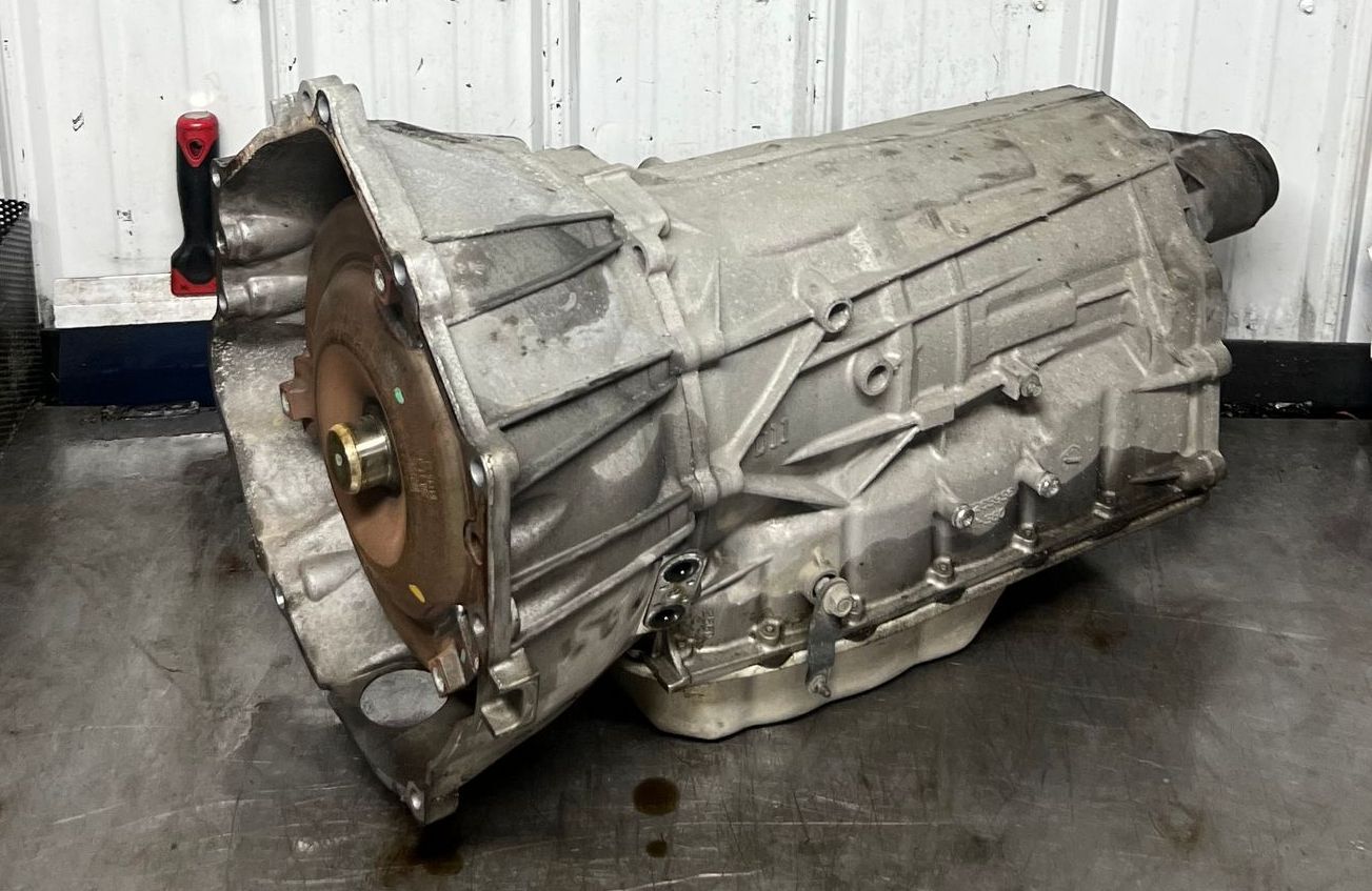 A close up of a gearbox on a table.