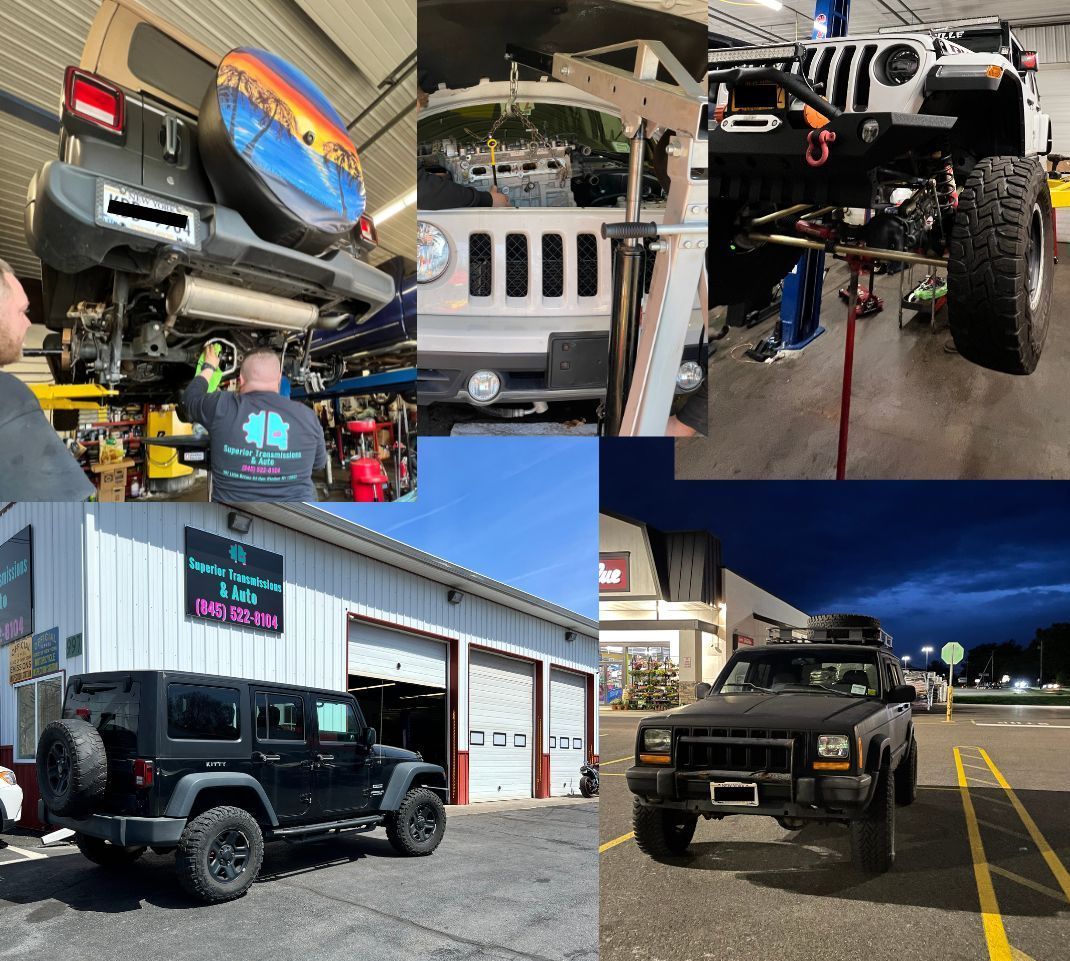 A jeep is being worked on in a garage