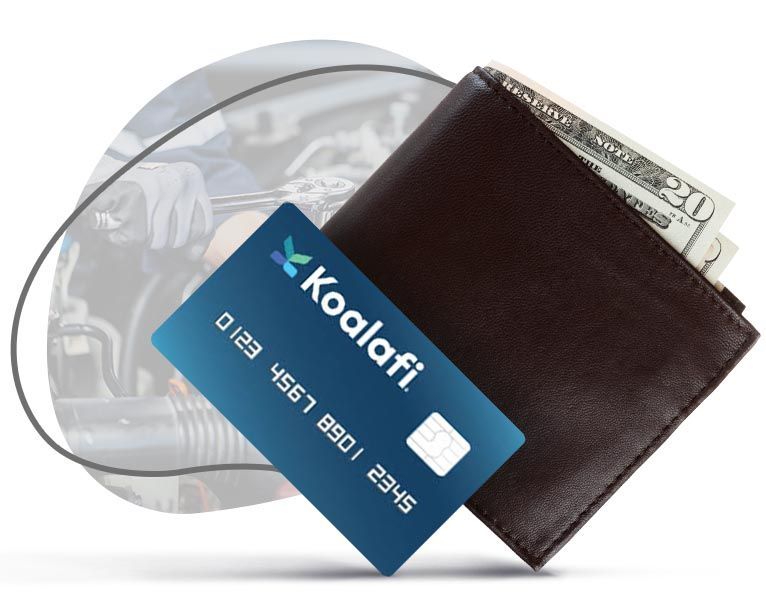 A koalafi credit card rests on top of a wallet