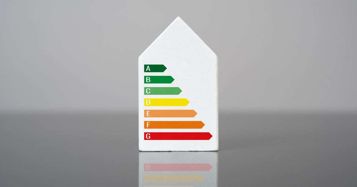 A house-shaped block with seven arrows, labeled A to G, transitioning in color from green to red.