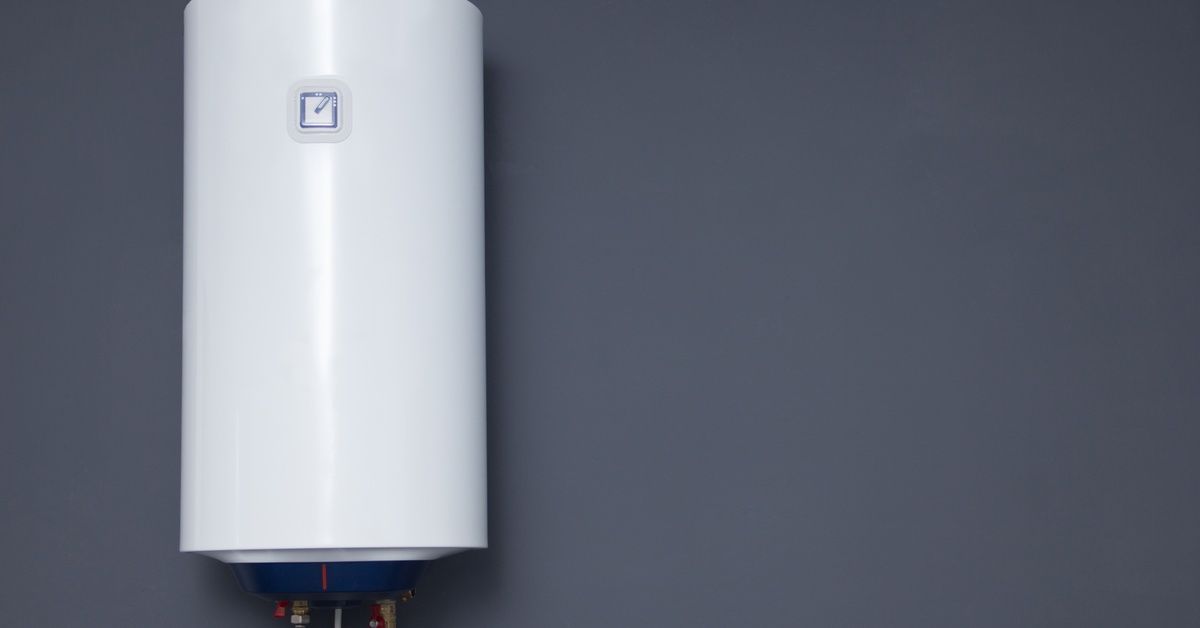 A sleek, white water heater with a blue, boxy logo on front against a gray background.