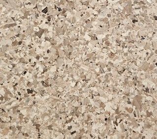 A close up of a granite counter top with a label on it.