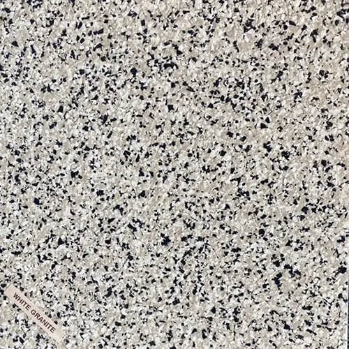 A close up of a white and black granite floor.