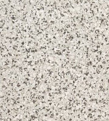 A close up of a gray tile with a label on it.