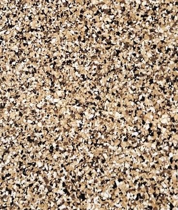 A close up of a concrete floor with a lot of small rocks on it.