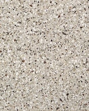 A close up of a tile with a lot of small stones on it.