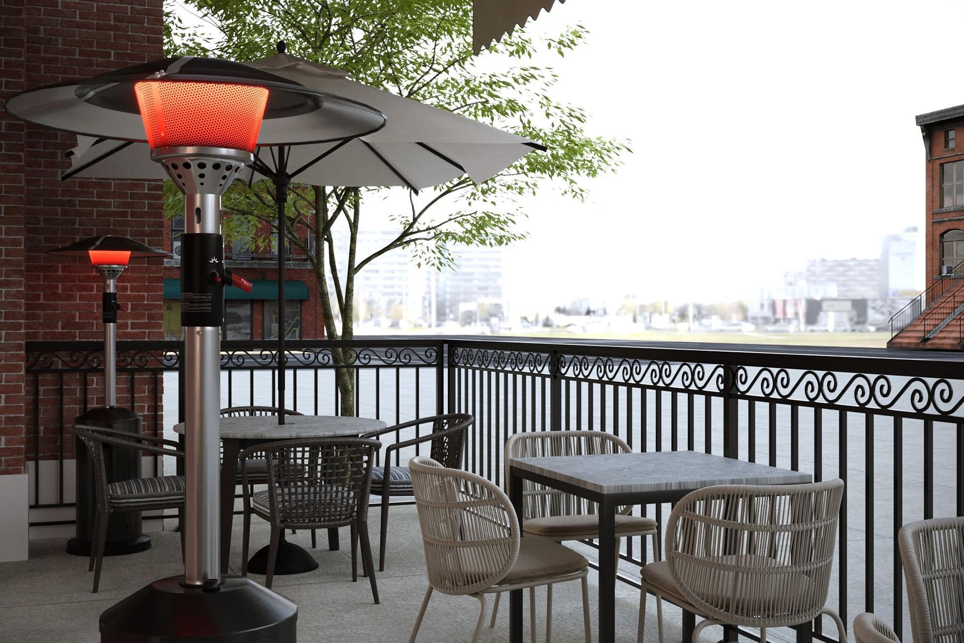 Outdoor patio with tables, chairs, umbrellas, and infrared heaters near a brick building.