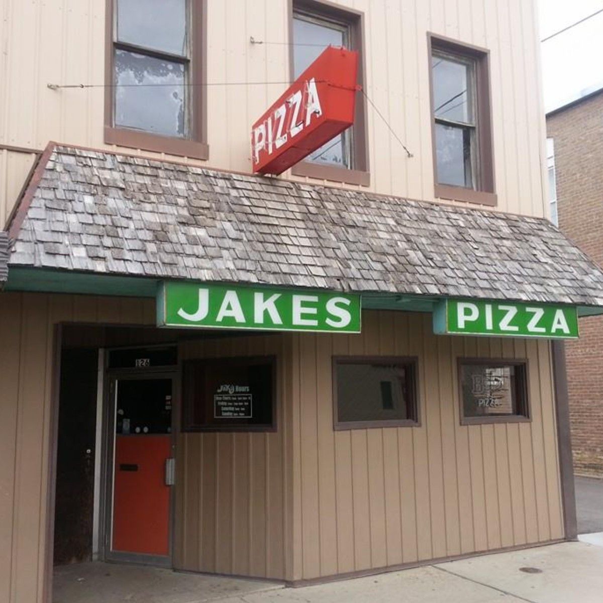 Jakes Pizza restaurant with a red 