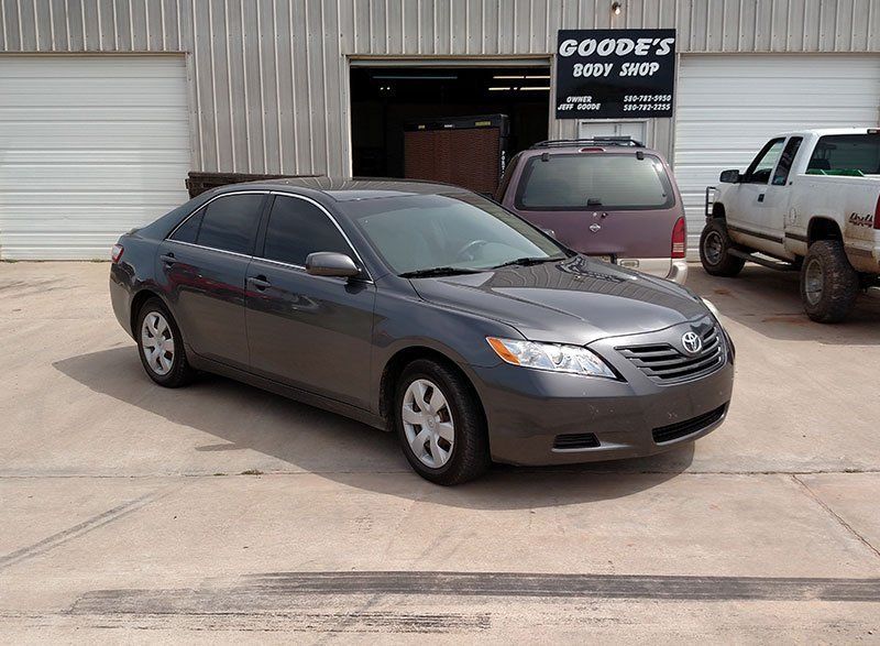 Car in front of the shop