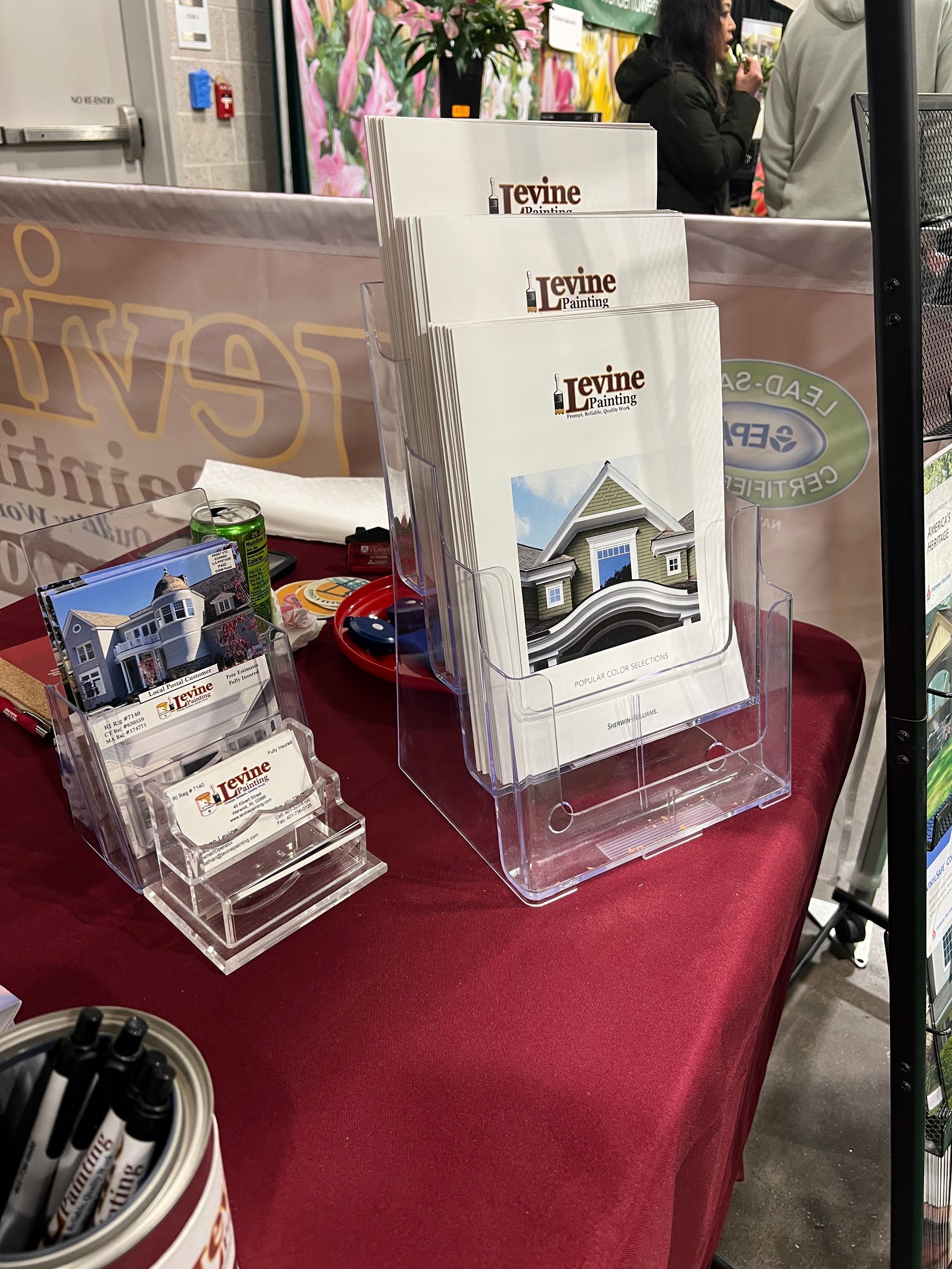 A table with a stack of brochures on it.