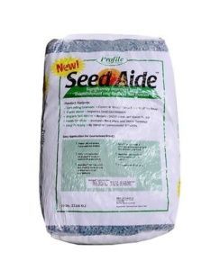 A bag of seed aide is sitting on a white surface.