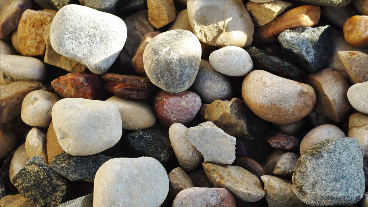 A pile of rocks of different sizes and colors