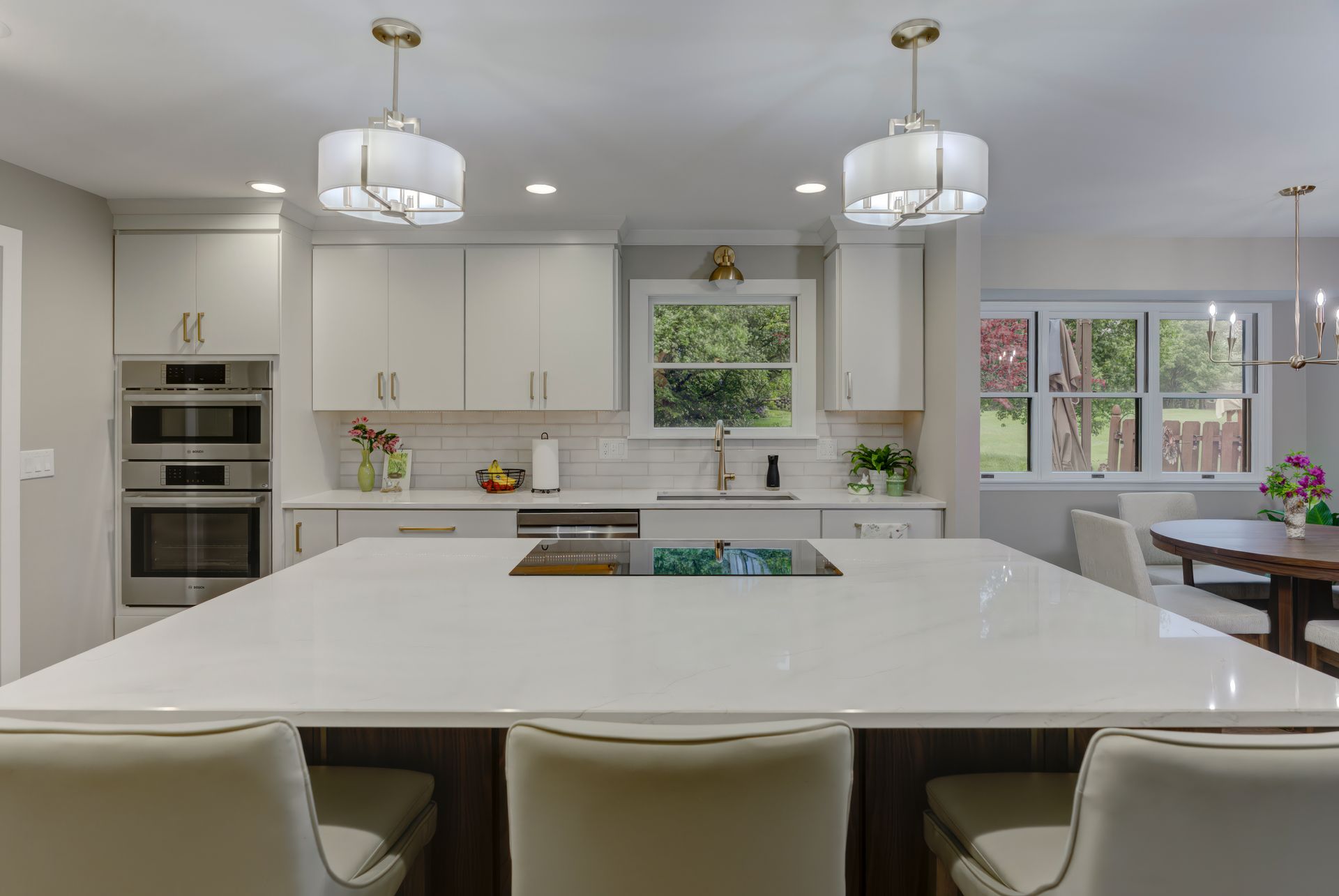There is a large island in the middle of the kitchen.