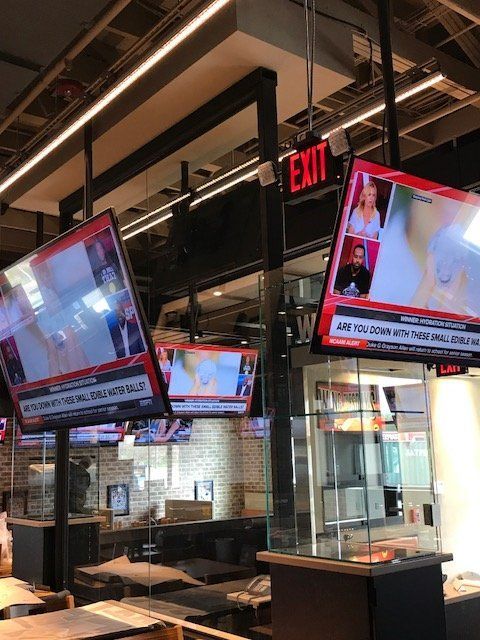 A restaurant with a sign that says exit on it