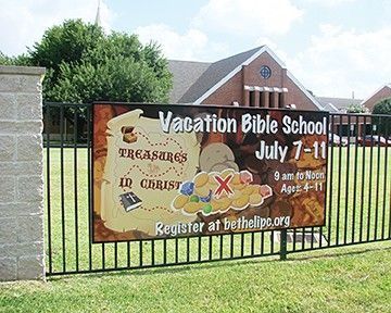 Sign promoting Vacation Bible School, July 7-11. Theme 