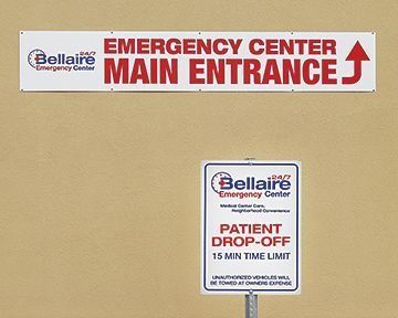 Signs for Bellaire Emergency Center: Main entrance and patient drop-off area.