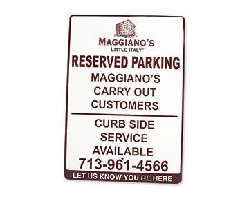 Sign for reserved parking at Maggiano's Little Italy, for carry-out customers. Includes phone number 713-961-4566.