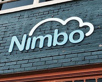Nimbo sign with a cloud above the light-blue word 