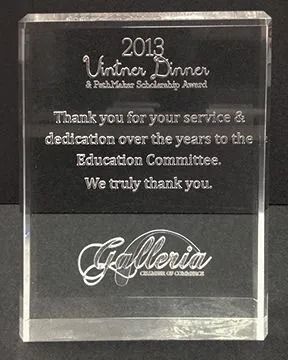 Clear acrylic award with engraved text for a Vintner Dinner, thanking the Education Committee.