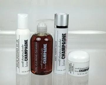 Skincare products: cleanser, toner, serum, and moisturizer, branded