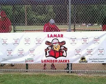 Banner for Lamar Lumberjacks baseball team, with logo, names, and sponsors, at a baseball field.