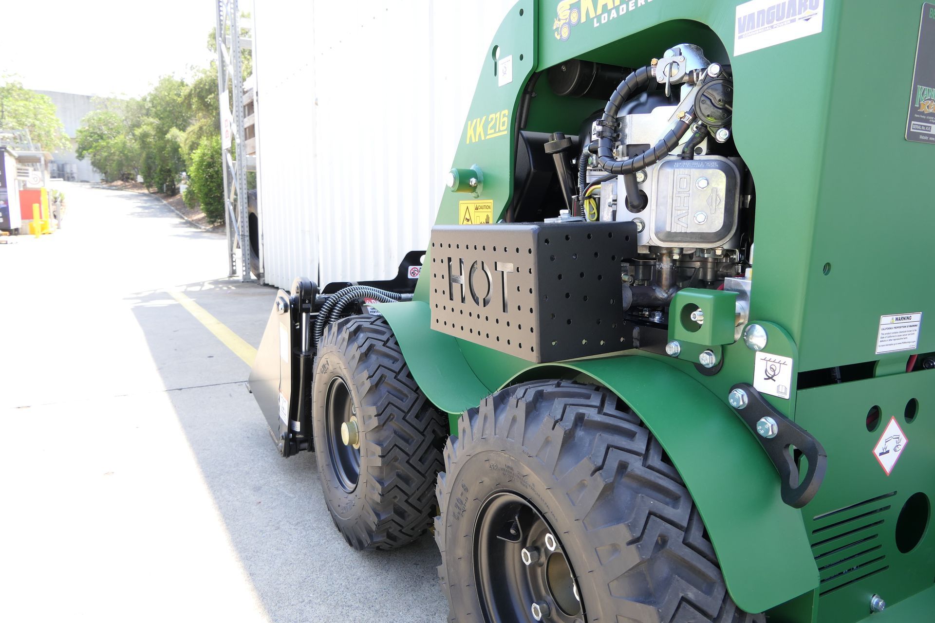 A green Kanga tractor with the word kot on the side