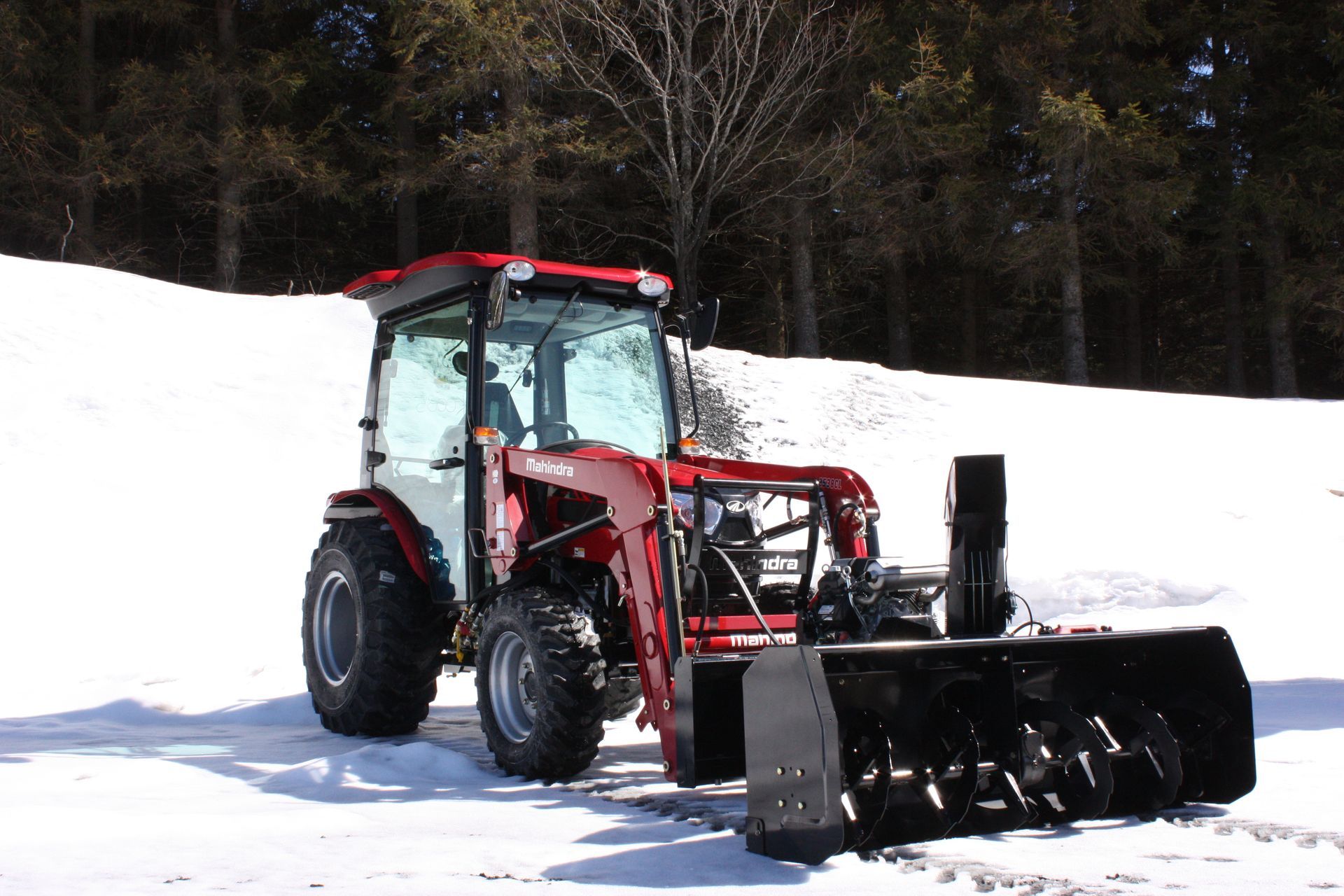 A red tractor with a snow blower 72″ VANTAGE SNOWBLOWER FOR TRACTORS EQUIPPED WITH