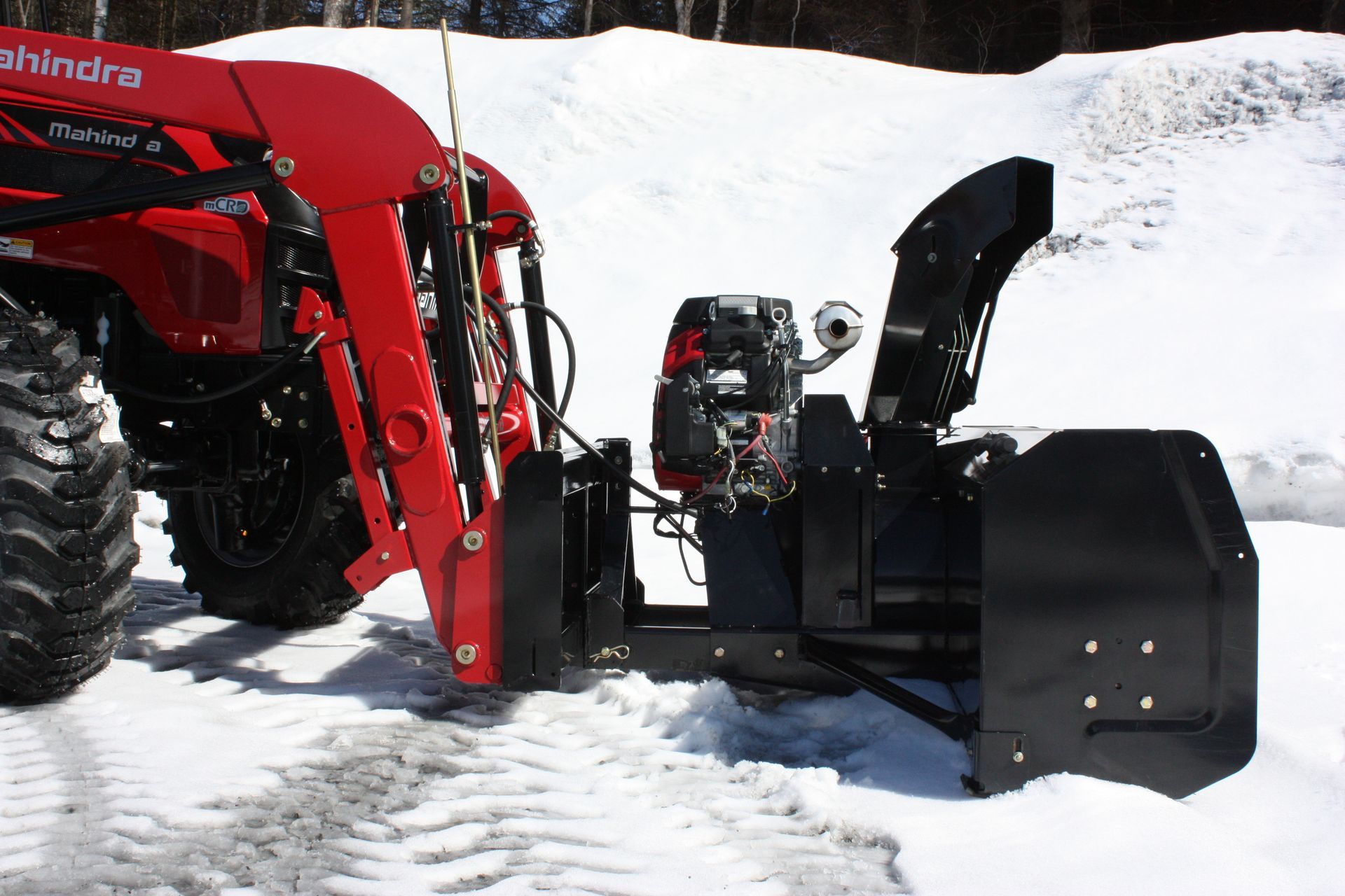 A tractor with a snow blower 72″ VANTAGE SNOWBLOWER FOR TRACTORS EQUIPPED WITH
