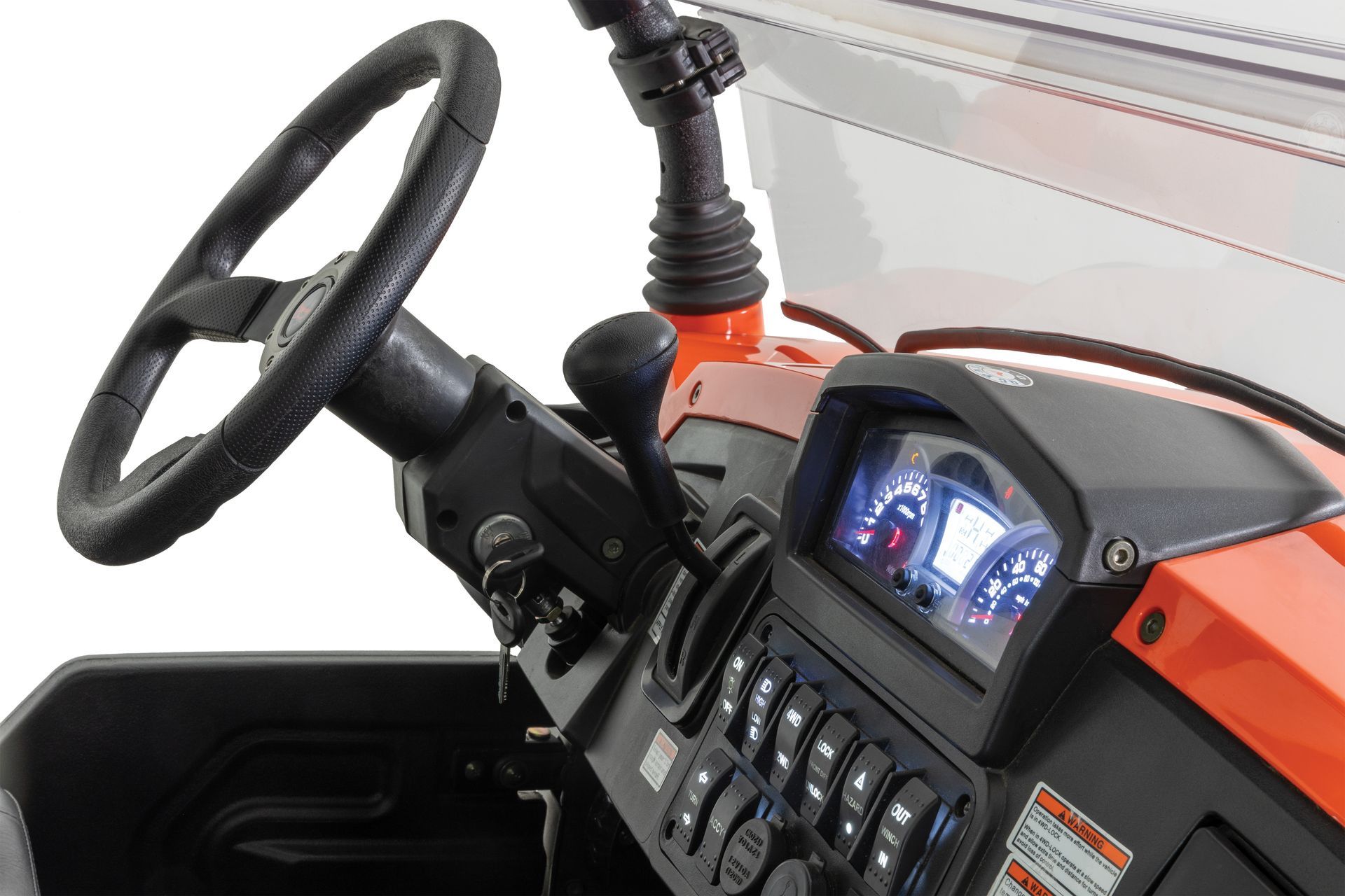 A close up of a steering wheel and dashboard of a vehicle