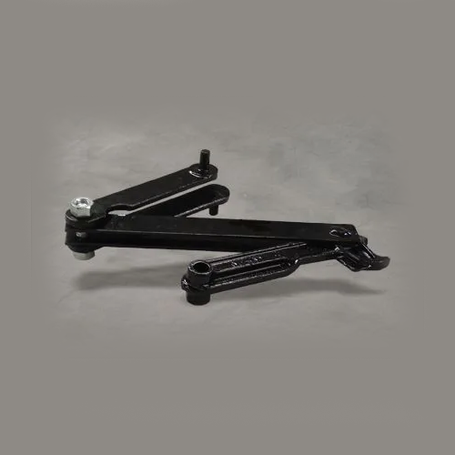 Black metal scissor jack on a gray background
