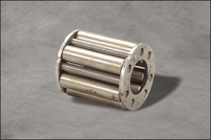 Metal cylindrical roller bearing with silver rollers on a gray background