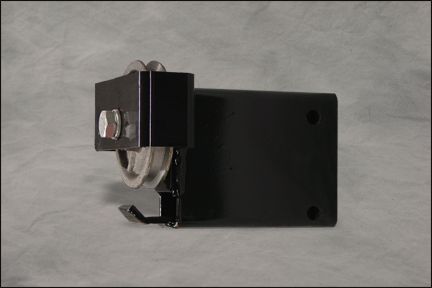 Black metal wall bracket with a silver clamp on a gray background
