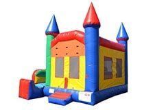 A colorful bouncy house with a slide attached to it on a white background.