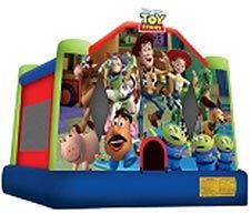 A bouncy house with a picture of Toy Story characters on it.