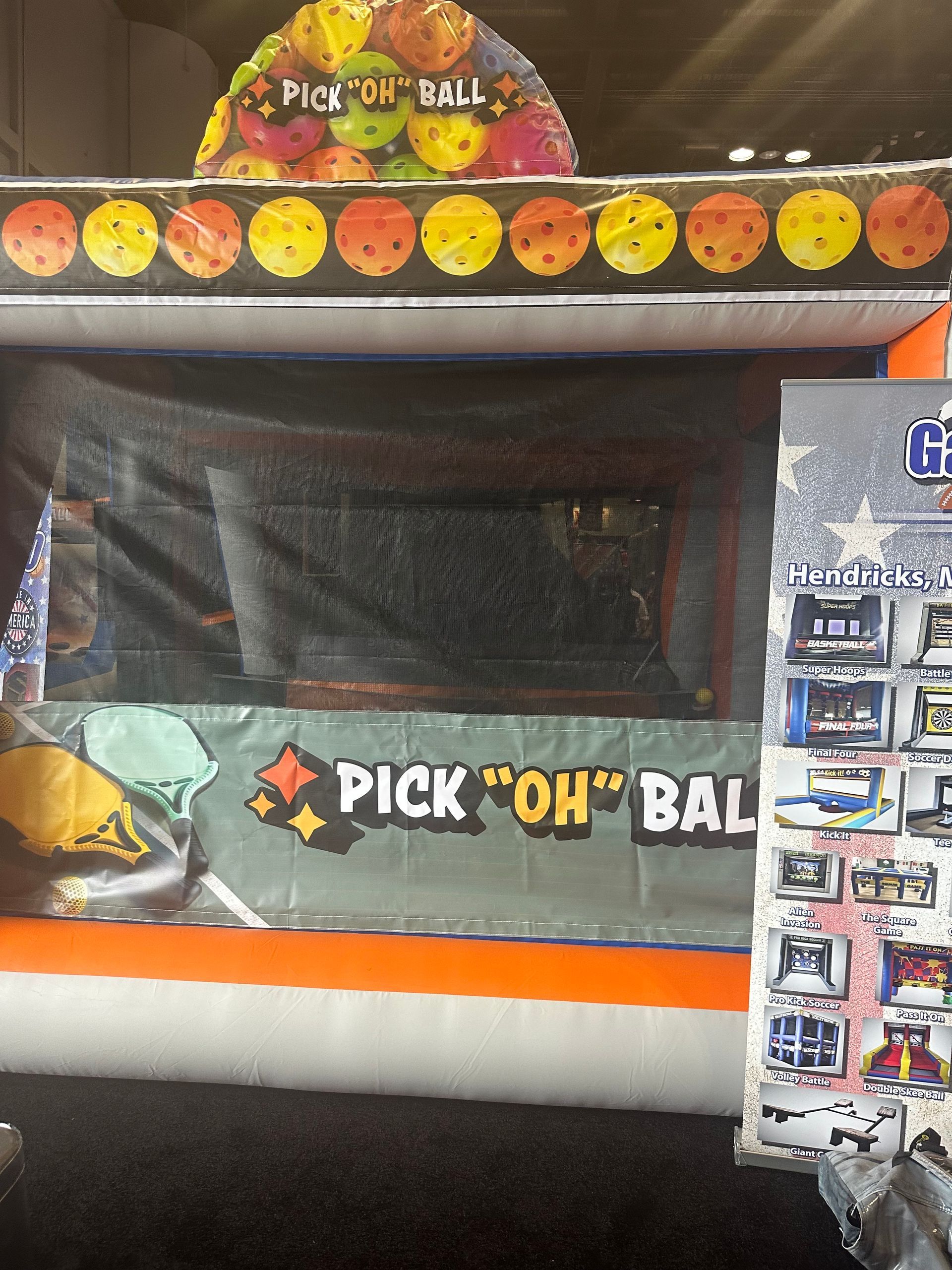 A sign that says pick oh ball on it