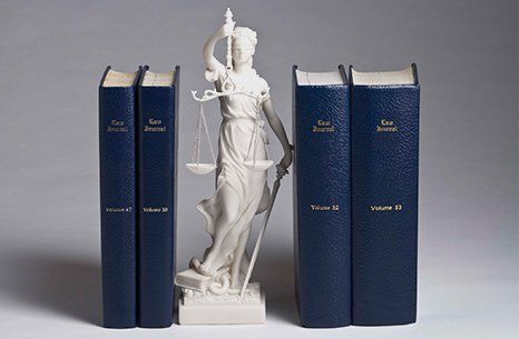 Law books and scale of justice