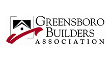 Logo for Greensboro Builders Association: house outline, red swoop, text