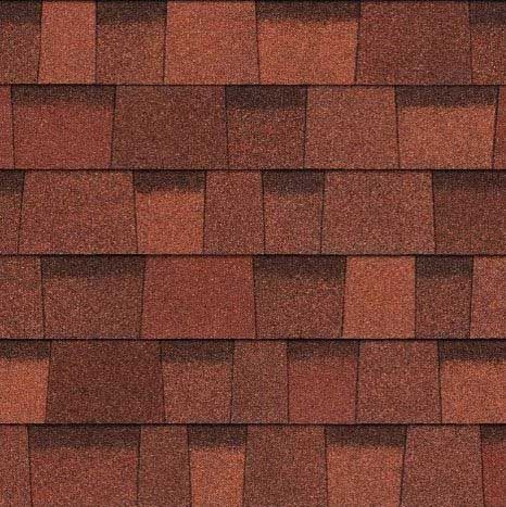 Red and brown asphalt roof shingles in a repeating pattern.