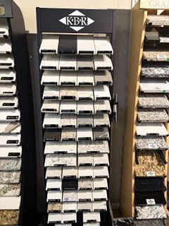 A display of granite counter tops in a store.