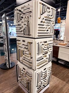 A display of cabinet handles and knobs in a store.