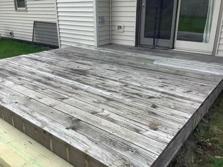 wooden deck white house - before