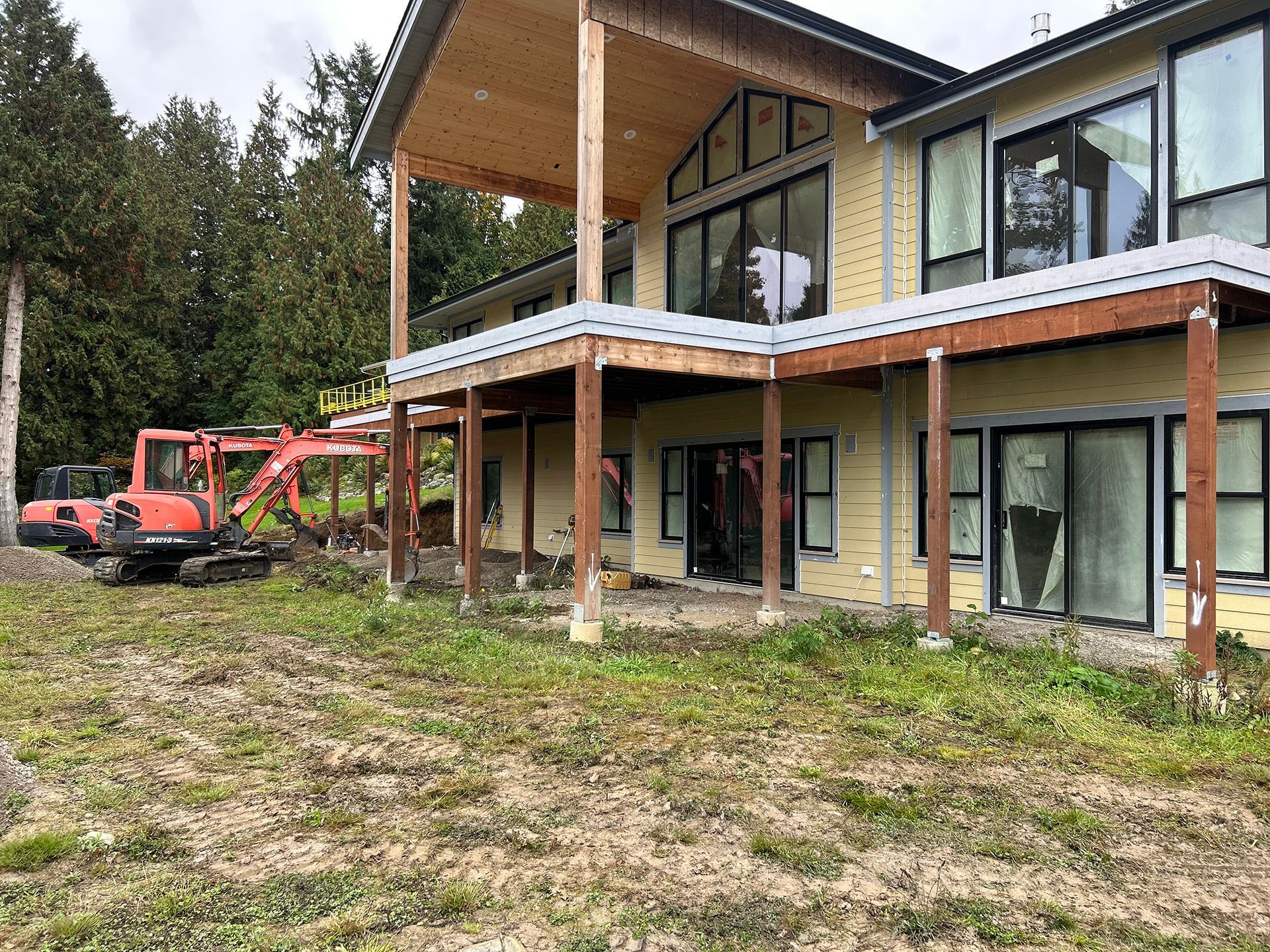 Two excavators in a residential area