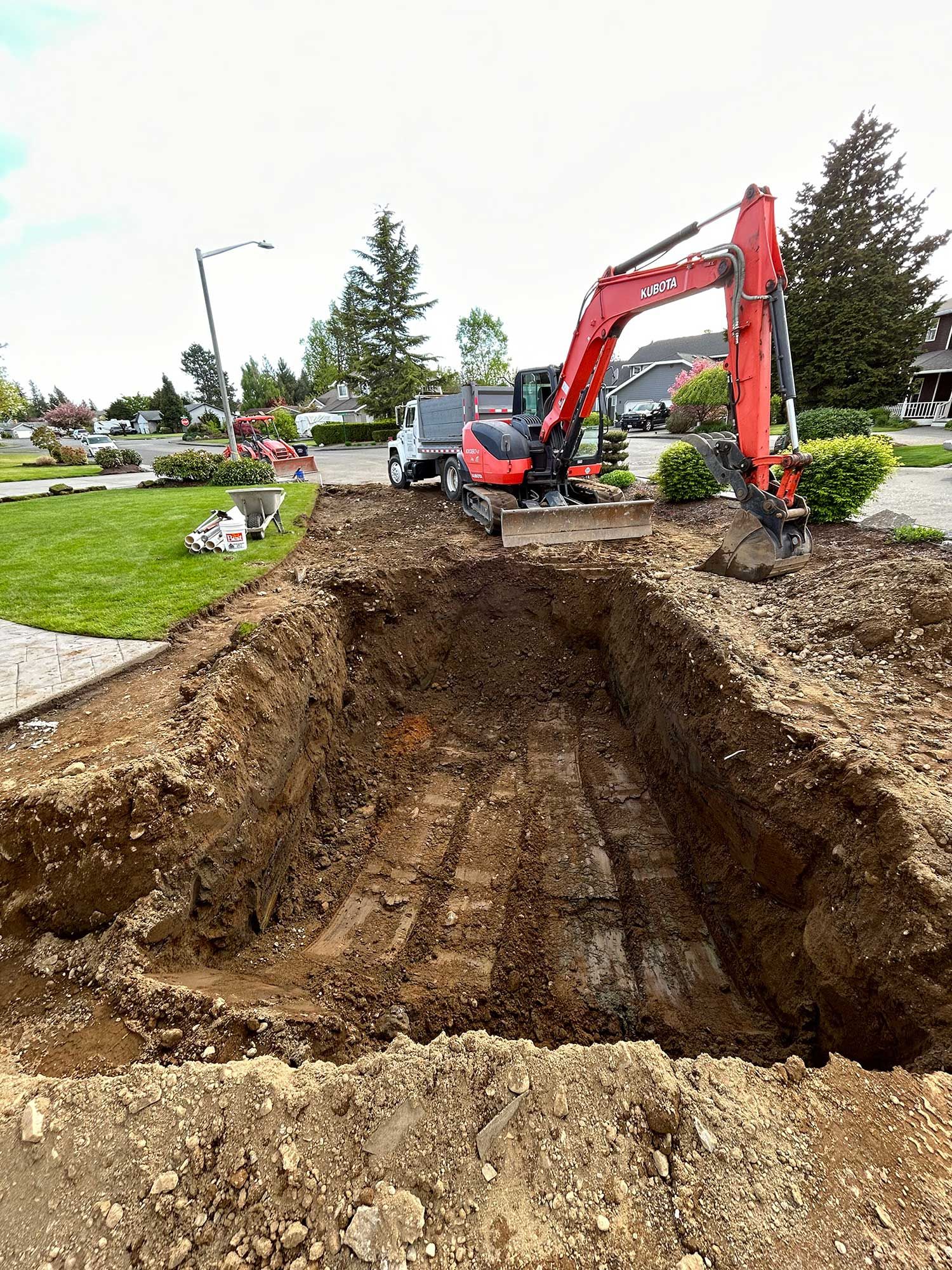 Excavator digging ground