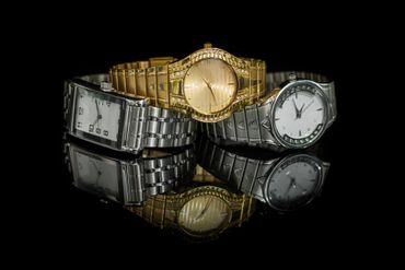 silver and gold watches