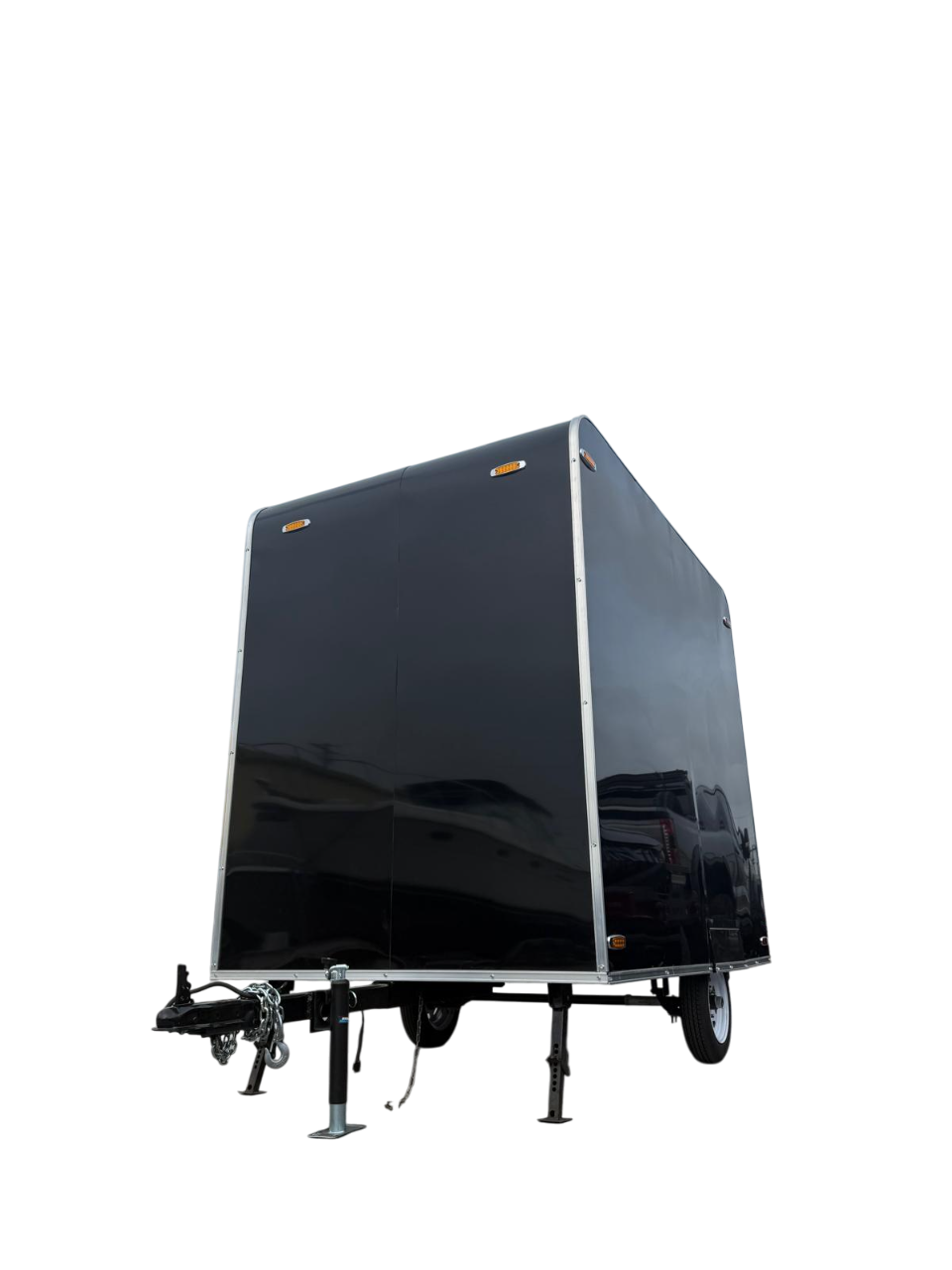 Black enclosed trailer with support legs, shown on a white background