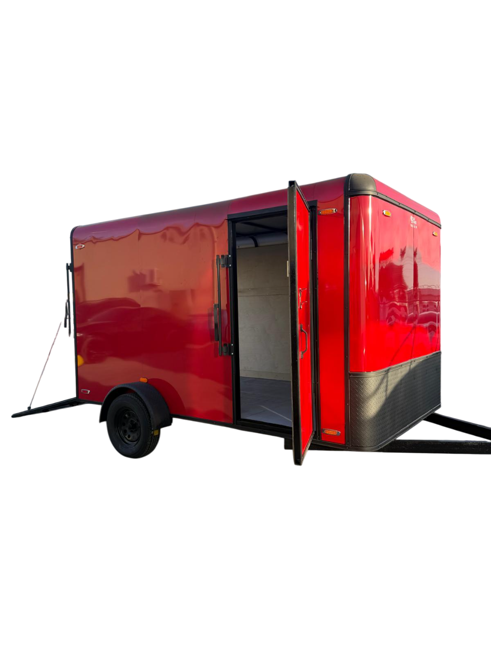 Red enclosed cargo trailer with an open side door and black wheels, shown on a white background